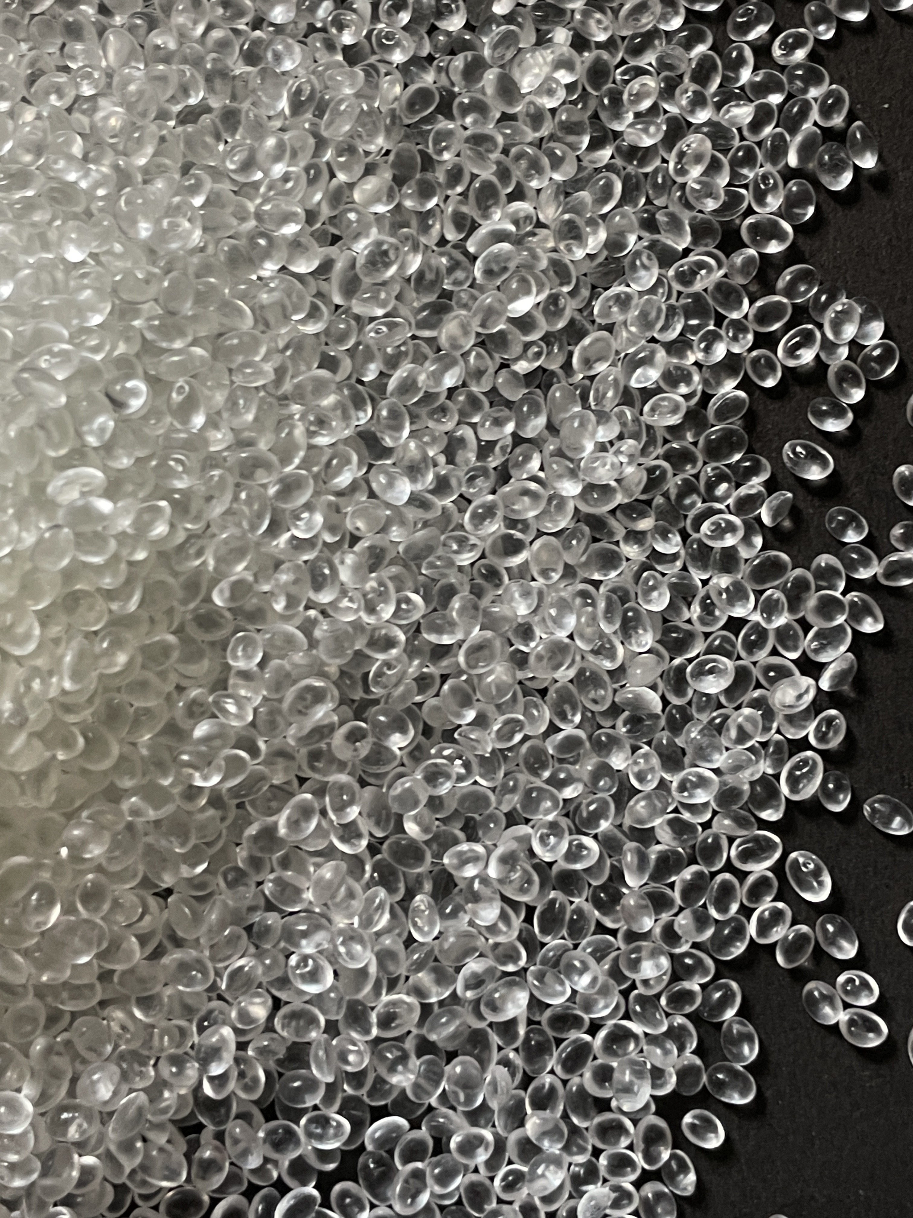 Close-up of transparent bioplastic granules